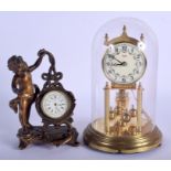 AN ANTIQUE SPELTER DESK CLOCK together with an anniversary clock. Largest 22 cm high. (2)