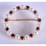 AN EDWARDIAN GOLD PEARL AND AMETHYST BROOCH. 10 grams. 4.25 cm wide.