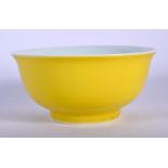 A CHINESE YELLOW GROUND PORCELAIN BOWL 20th Century, bearing Kangxi marks to base. 11 cm diameter.