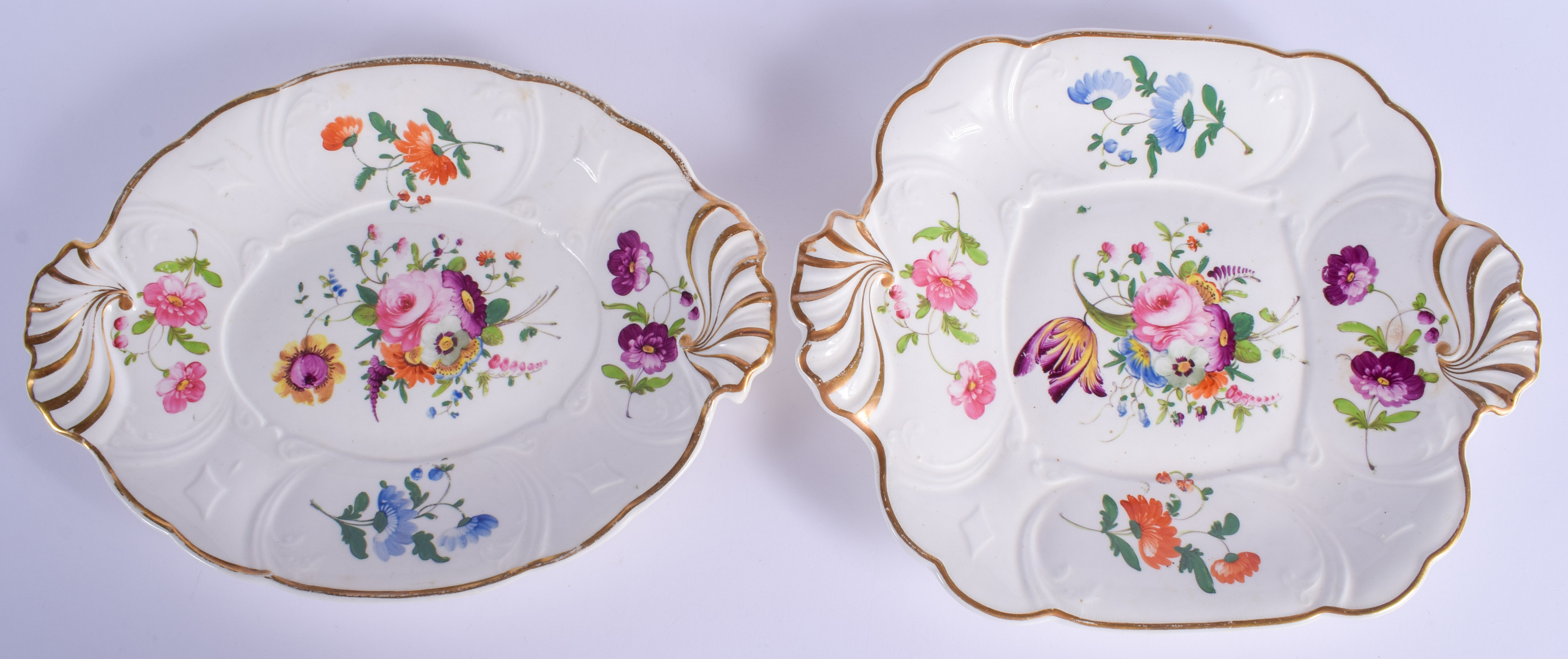 TWO EARLY 19TH CENTURY ENGLISH PORCELAIN DISHES probably Coalport, painted with flowers. Largest 27