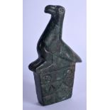AN UNUSUAL EARLY 20TH CENTURY JADE SERPENTINE STONE FIGURE OF A STYLISED BIRD decorated with motifs.
