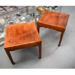 A PAIR OF 19TH CENTURY CHINESE CARVED ELM SQUARE FORM TABLES of good colour, support on tapering leg