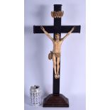 A LARGE 19TH CENTURY CARVED EUROPEAN IVORY CRUCIFIX modelled upon an ebonised cross. 56 cm x 18 cm.