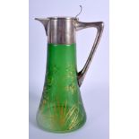 A LARGE ART NOUVEAU SILVER MOUNTED GREEN GLASS CLARET JUG painted with gilt flowers. 28 cm high.