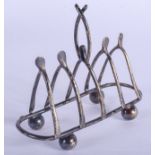 A VINTAGE SILVER WISHBONE TOAST RACK. 64 grams. 11 cm wide.