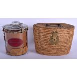 A JAMAICAN CIGAR GLASS HUMIDOR together with a wicker carrier. (2)