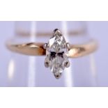 A 14CT GOLD MARQUISE CUT DIAMOND RING. M. 2.4 grams. Diamond 0.9 cm x 0.4 cm.