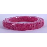 A CHINESE PINK JADE BANGLE 20th Century. 8 cm diameter.