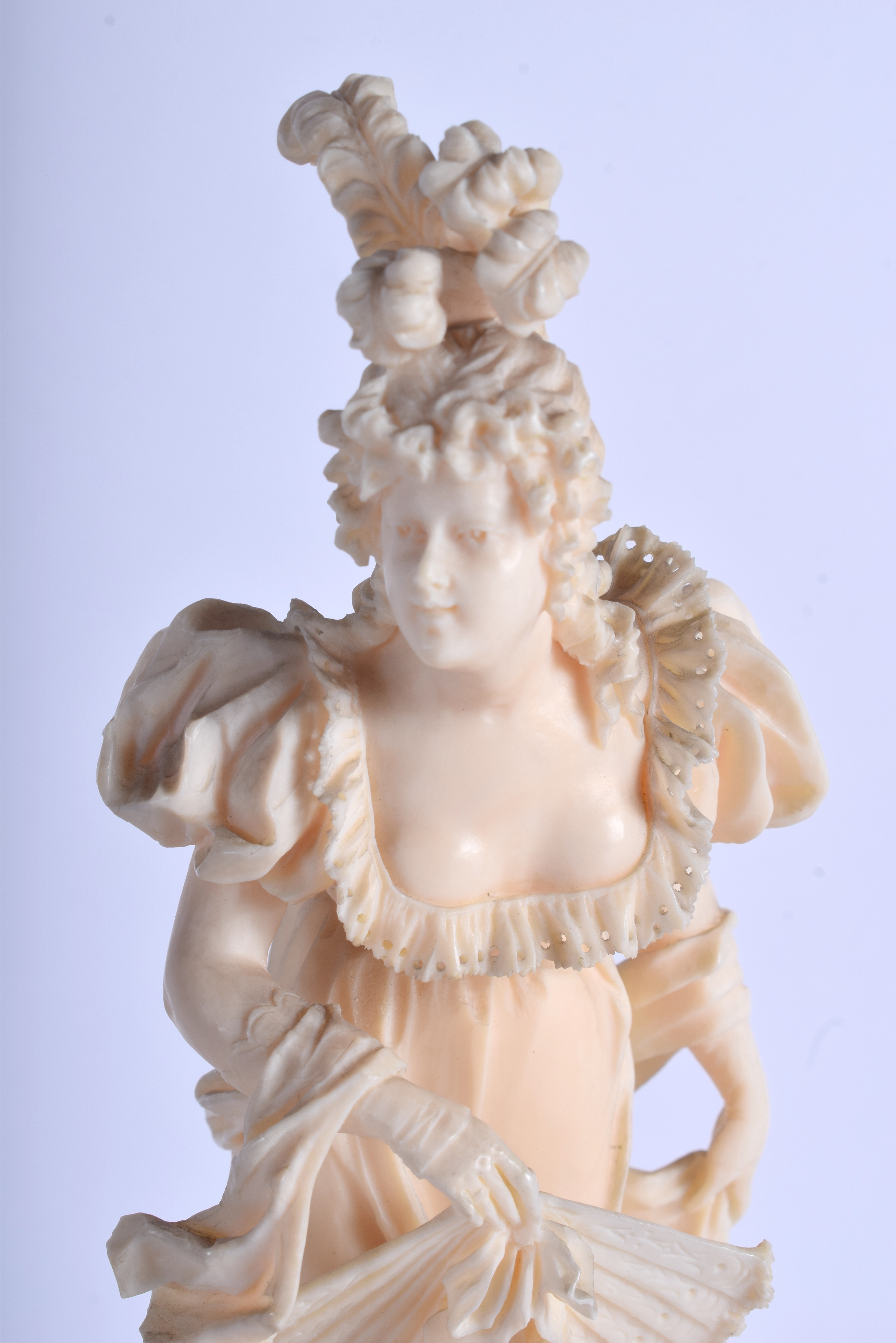 A PAIR OF 19TH CENTURY EUROPEAN CARVED DIEPPE IVORY FIGURES modelled as a dandy and female upon cyli - Image 4 of 5