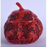 A 1930S CHINESE RED LACQUER MELON FORM BOX AND COVER decorated with foliage. 12 cm x 12 cm.