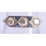 AN ART DECO WHITE GOLD DIAMOND AND SAPPHIRE RING of approx 0.5 cts. 2.4 grams. O/P.