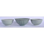 THREE CHINESE CELADON BOWLS 20th Century. Largest 14 cm wide. (3)