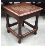 A SMALL 17TH/18TH CENTURY OAK JOINT STOOL. 36 cm x 34 cm.
