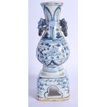 A RARE CHINESE BLUE AND WHITE PORCELAIN VASE ON STAND 20th Century, painted with foliage and vines.