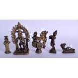 FIVE 19TH CENTURY INDIAN HINDU BRONZE FIGURES including a reclining male under snakes. Largest 12 cm