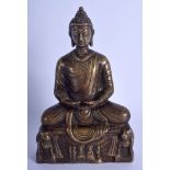 A 19TH CENTURY INDIAN BRONZE FIGURE OF A SEATED DEITY modelled with hands clasped. 21 cm x 11 cm.