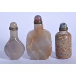 THREE CHINESE CARVED AGATE STONE SNUFF BOTTLES 20th Century. Largest 9 cm x 3.5 cm. (3)