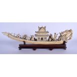 A GOOD 19TH CENTURY CHINESE CANTON IVORY DRAGON BOAT Qing, of unusually fine quality, modelled with