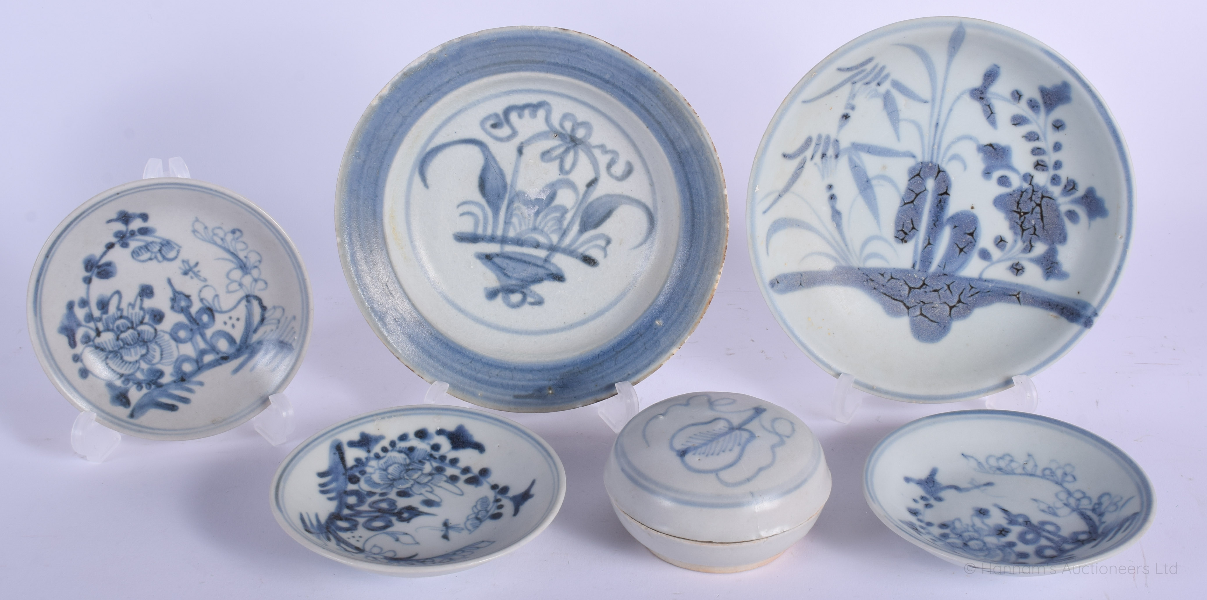 THREE CHINESE TEK SING CARGO PORCELAIN SAUCERS together with plates etc. Largest 12 cm wide. (6)