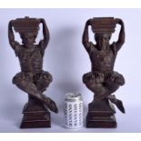 A PAIR OF 19TH CENTURY EUROPEAN CARVED WOOD FIGURES possibly Black Forest. 37 cm high.