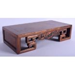 A 1950S CHINESE CARVED HARDWOOD LOW OPIUM SCHOLARS TABLE Late Qing/Republic. 40 cm x 20 cm.