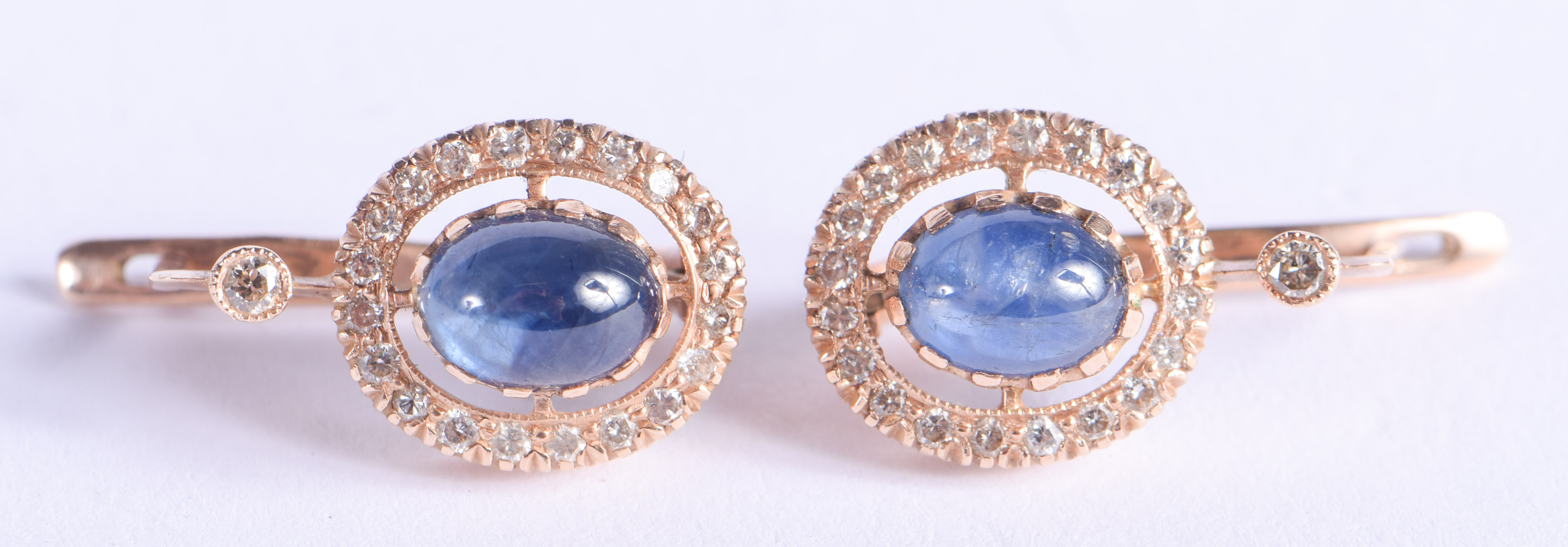 A PAIR OF 14CT GOLD DIAMOND AND SAPPHIRE EARRINGS. 6.2 grams. 1.8 cm long.