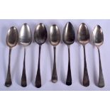 SIX 18TH/19TH CENTURY ENGLISH SILVER SPOONS together with a plated spoon, assorted dates. 365 grams.