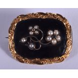 AN ANTIQUE GOLD ENAMEL AND SEED PEARL MOURNING BROOCH. 6.7 grams. 2.75 cm x 1.75 cm.