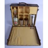 A RARE VINTAGE FRENCH LOUIS VUITTON GENTLEMAN'S WHISKEY CARRYING CASE of typical design with brass m