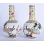 A PAIR OF CHINESE REPUBLICAN PERIOD FAMILLE ROSE VASES decorated with flowers and birds. 24 cm high.