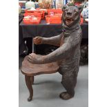 A VERY RARE LARGE 19TH CENTURY BAVARIAN BLACK FOREST THRONE CHAIR formed as a standing bear with arm