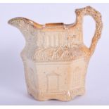 A VERY RARE 19TH CENTURY ENGLISH STONEWARE CREAM JUG in the form of a house. 11 cm x 8 cm.