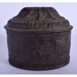 A GEORGE III LEAD TOBACCO BOX AND COVER decorated with various armorial shields. 15 cm x 13 cm.