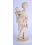 A 19TH CENTURY JAPANESE MEIJI PERIOD CARVED IVORY OKIMONO modelled as a female roaming with a child