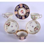 19th c. Coalport moulded teacup and saucer painted with flowers on a blue ground and two teacups and