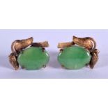 A PAIR OF 18CT GOLD MOUNTED JADEITE EARRINGS. 4 grams. Jadeite 1.5 cm x 1 cm.