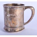 A VINTAGE SILVER MUG. 93 grams. 7.5 cm high.