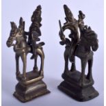 A PAIR OF 19TH CENTURY INDIAN BRONZE HORSES modelled with warriors upon there back. 14 cm high.