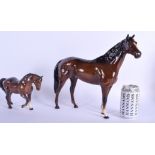 A RARE LARGE BESWICK PORCELAIN HORSE together with a smaller horse. Largest 33 cm x 30 cm. (2)
