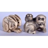 A 19TH CENTURY JAPANESE MEIJI PERIOD CARVED IVORY NETSUKE together with another. Largest 4.5 cm x 3.