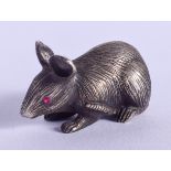 A SMALL CONTINENTAL SILVER FIGURE OF A MOUSE with ruby eyes. 59 grams. 3 cm x 2 cm.