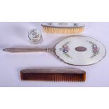 AN ANTIQUE SILVER AND ENAMEL DRESSING TABLE SET decorated with foliage. 460 grams overall. Largest 3