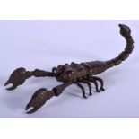 A JAPANESE BRONZE OKIMONO modelled as a scorpion. 10 cm x 3.5 cm.