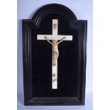 A 19TH CENTURY EUROPEAN CARVED CORPUS CHRISTI upon a wooden plaque. Ivory 44 cm x 17 cm.