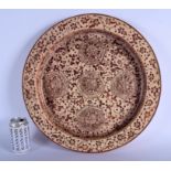 A VERY LARGE SPANISH VALENCIA HISPANO MORESQUE POTTERY DISH decorated with floral roundels and motif