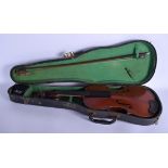 A CASED VIOLIN with bow. 56 cm long. (2)