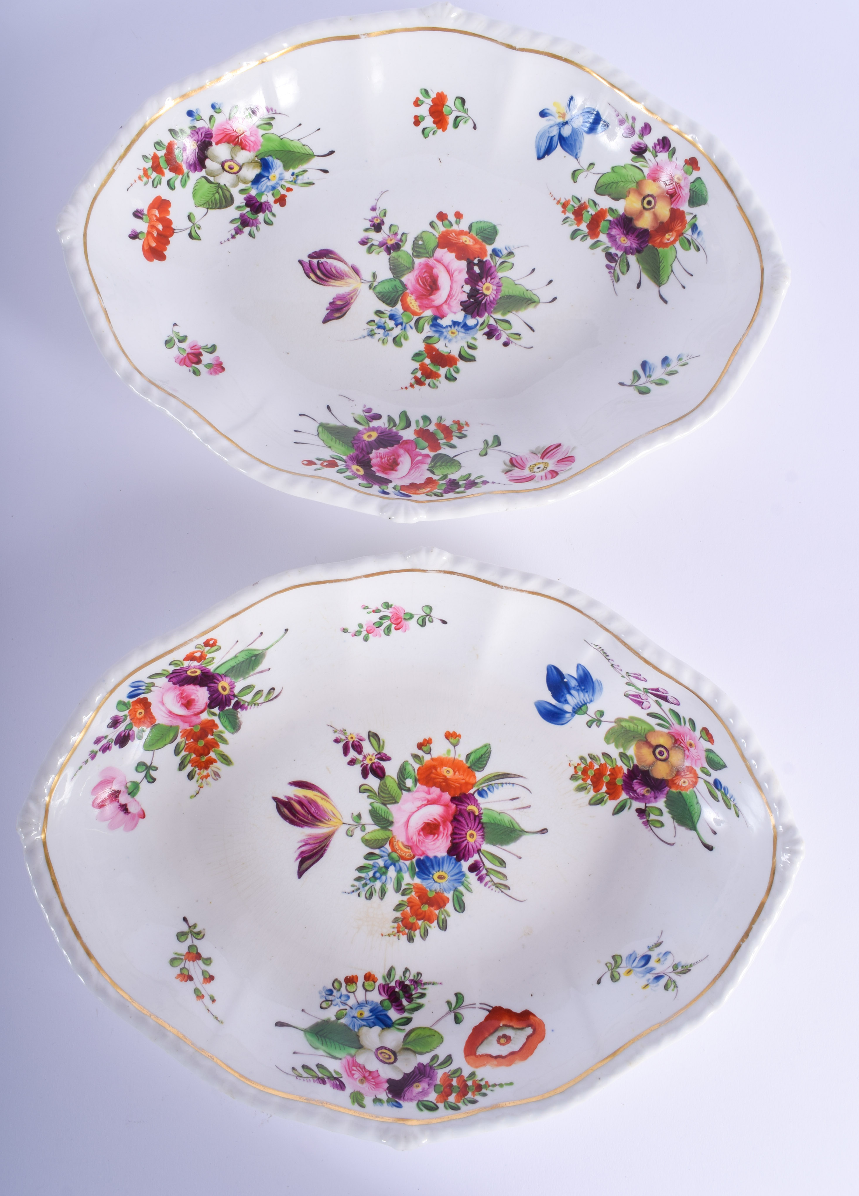 A PAIR OF EARLY 19TH CENTURY DERBY PORCELAIN OVAL DISHES painted with floral sprays. 30 cm x 22 cm.