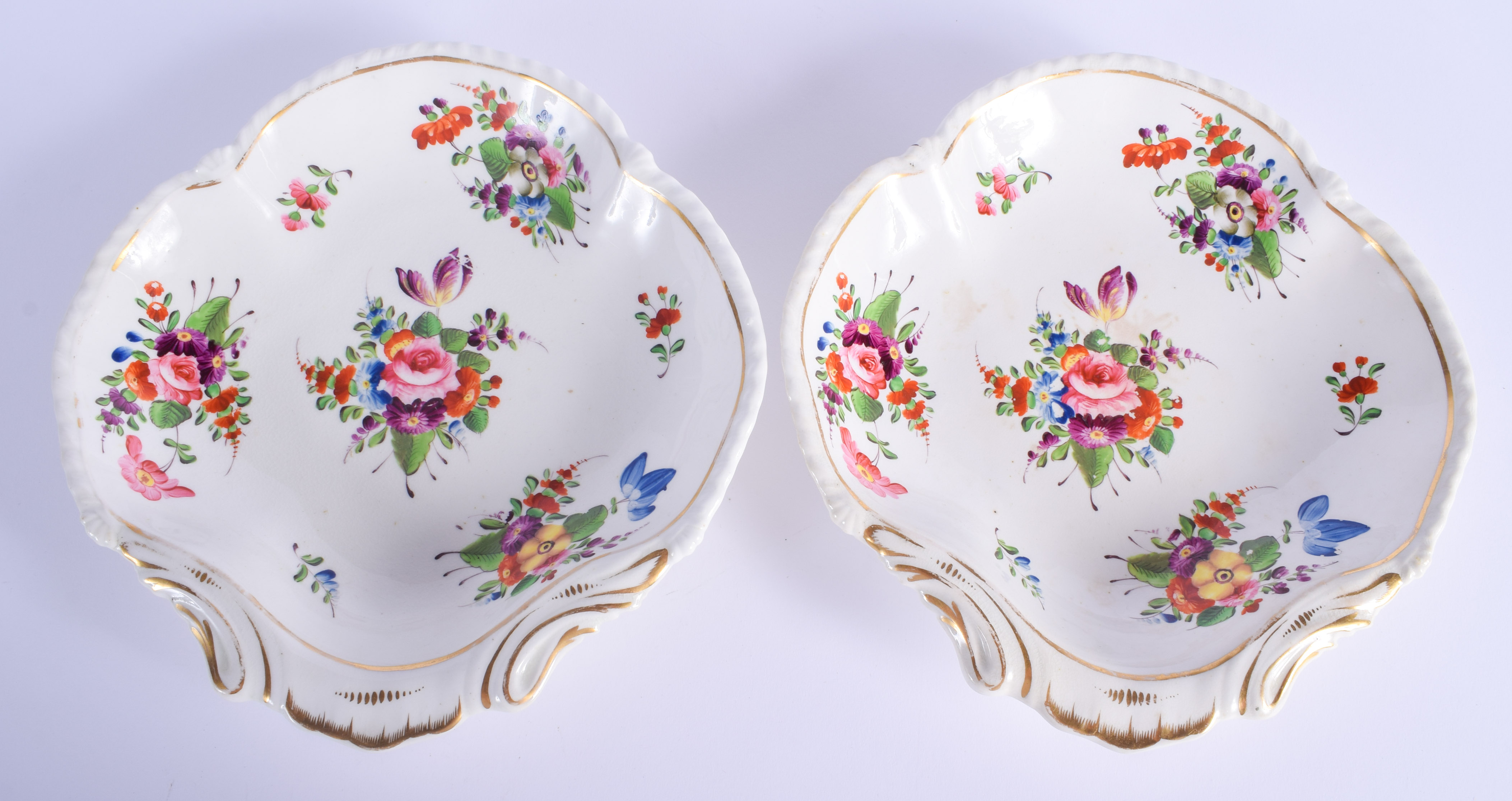 A PAIR OF EARLY 19TH CENTURY DERBY PORCELAIN TREFOIL DISHES painted with flowers. 21 cm x 24 cm.