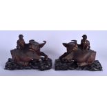 A PAIR OF 19TH CENTURY CHINESE CARVED BUFFALO HARDWOOD FIGURES Qing. 23 cm x 22 cm.