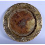 AN ARTS AND CRAFTS EUROPEAN BRASS DISH probably Austrian, decorated with stylised foliage. 33 cm wid